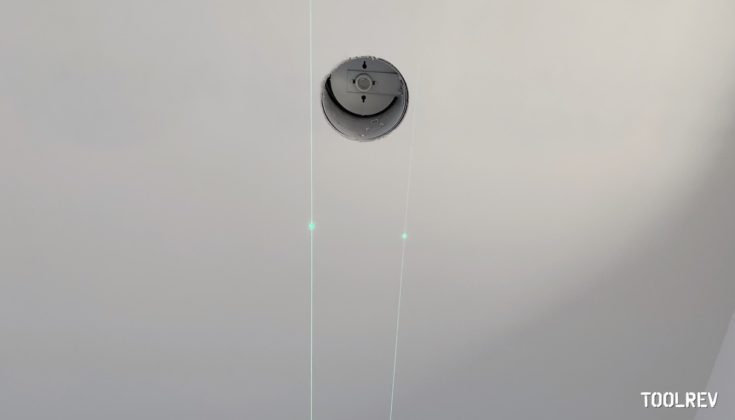 Dewalt and Makita green laser lines on ceiling.