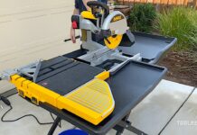 DeWalt D24000S Review: Best 10″ Wet Tile Saw for Pros (2025) dewalt tile saw in yellow and black in driveway