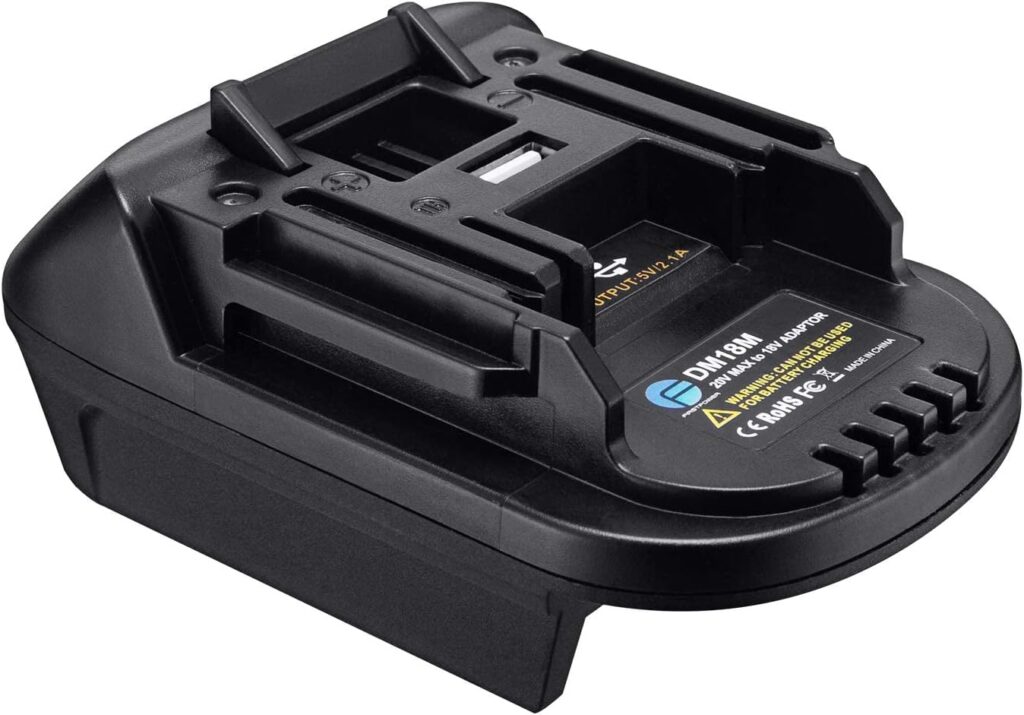 Battery adapter in black coloring against a white background.
