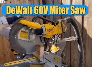 DeWalt miter saw cutting wood outdoors.