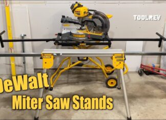 Dewalt portable rolling and folding miter saw stands in garage.