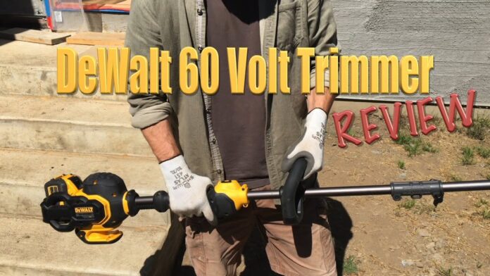 dewalt dcst970 string trimmer held by worker wearing white gloves