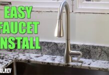 kitchen faucet on granite counter top