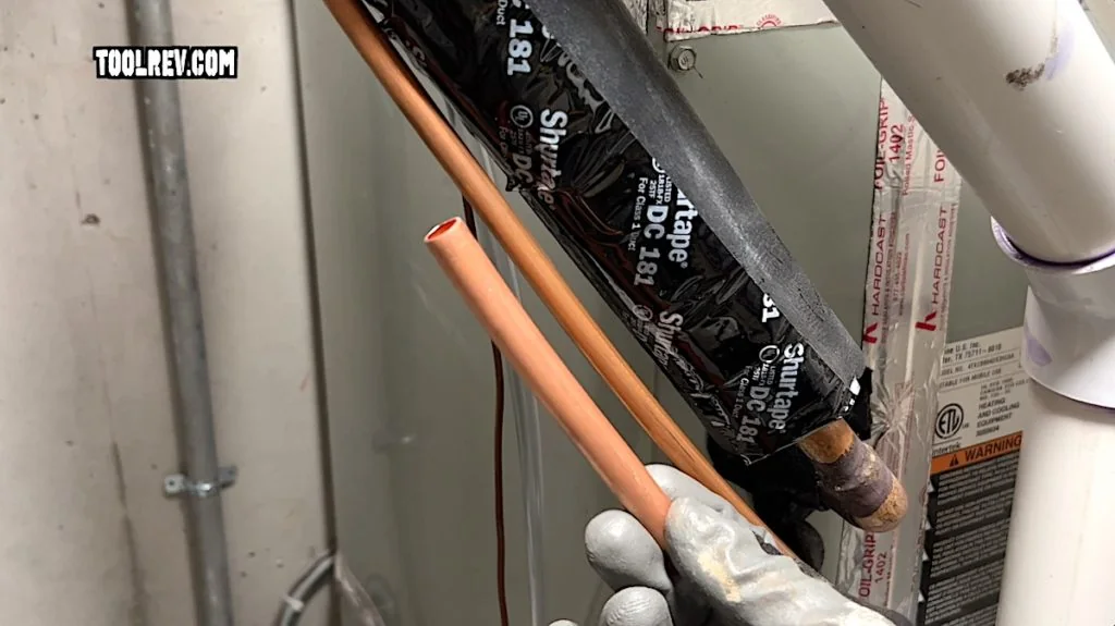 Insulated mini-split lineset held next to bare ACR copper tubing Insulated mini-split lineset held next to bare ACR copper tubing