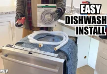 How to Install a Dishwasher Dishwasher pulled out in a kitchen with water line and installation supplies, easy dishwasher install