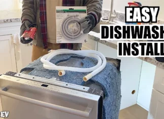 Dishwasher pulled out in a kitchen with water line and installation supplies, easy dishwasher install