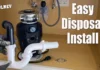 How to Install a Garbage Disposal Garbage disposal mounted under a kitchen sink with drain pipes, easy disposal install