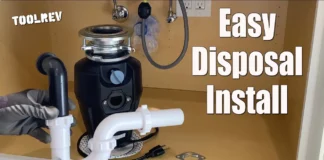 Garbage disposal mounted under a kitchen sink with drain pipes, easy disposal install