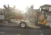 How to Rent and Operate a Mini Excavator Rental mini excavator on a trailer behind a pickup truck in a driveway