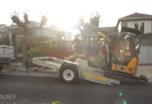 How to Rent and Operate a Mini Excavator Rental mini excavator on a trailer behind a pickup truck in a driveway